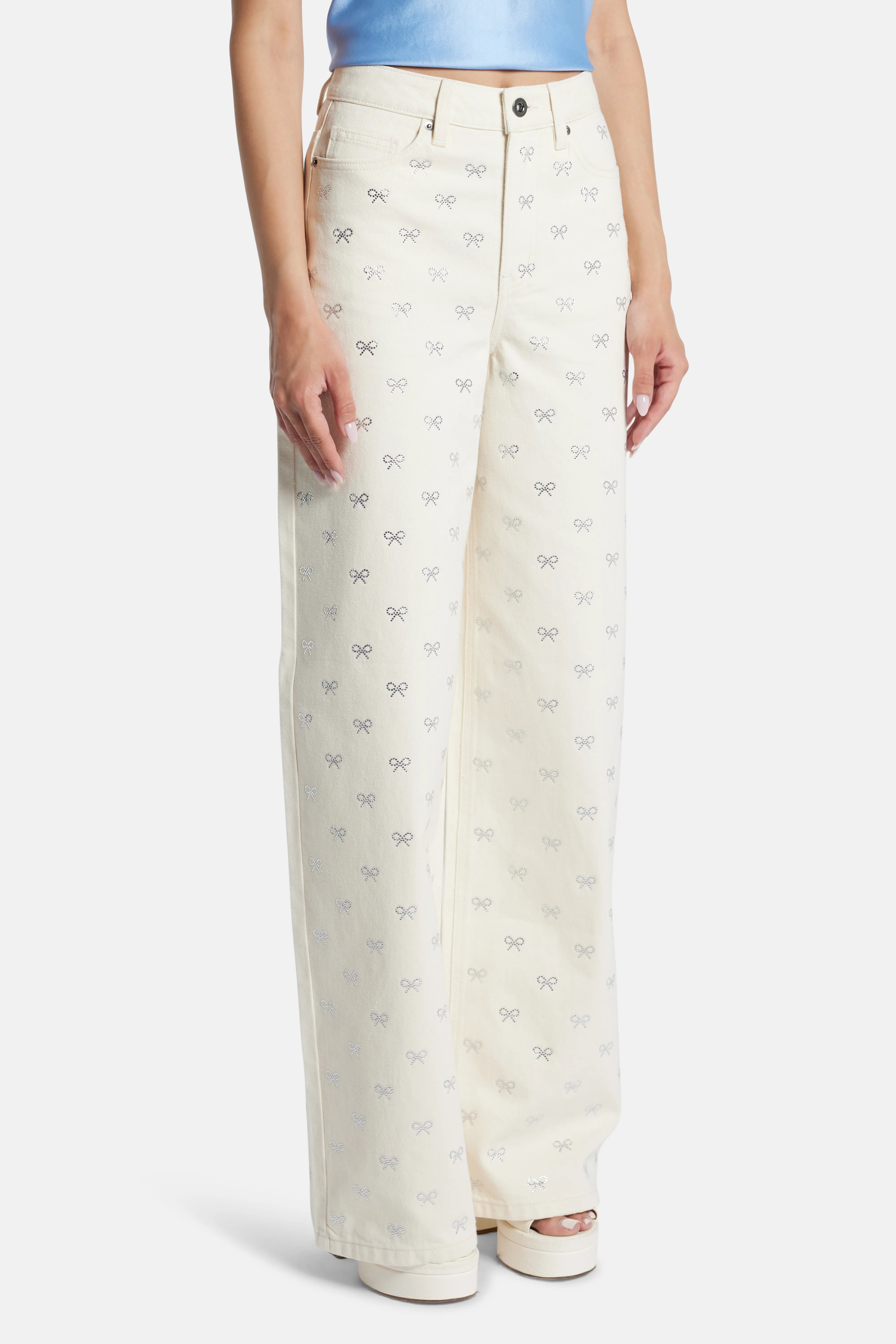 Diamante Bow Denim Flared Jeans in Cream