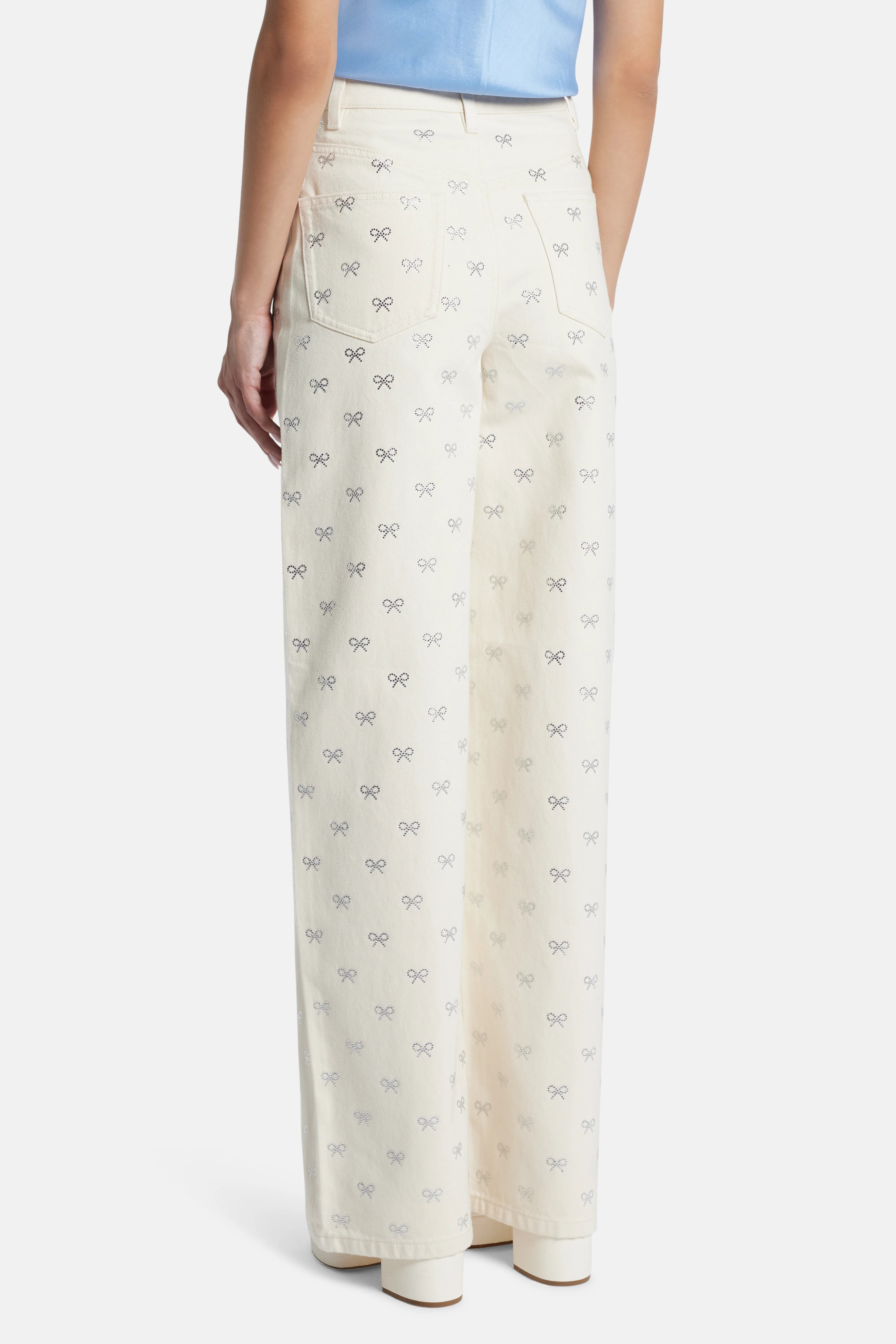 Diamante Bow Denim Flared Jeans in Cream