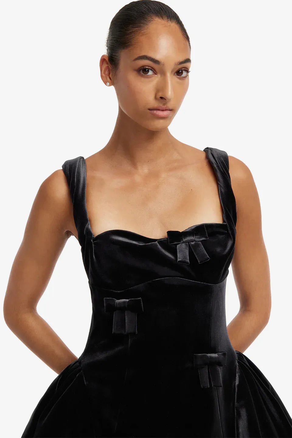 Ariel Velvet Bow Applique Sleeveless Mini Dress in Black